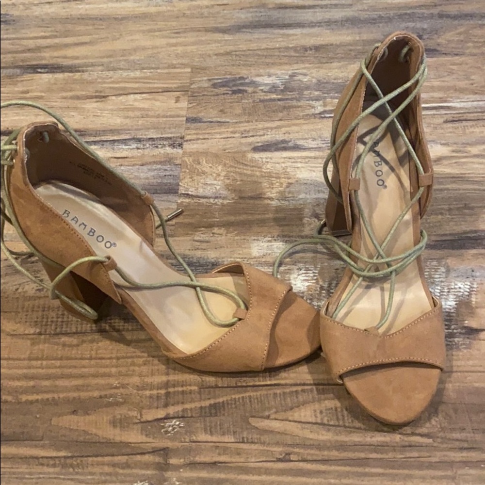 Tie up the ankles tan heels! Size 7